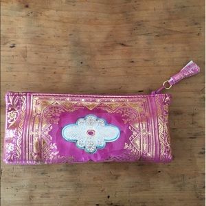 18K EMBOSSED LEATHER POUCHETTE FROM ITALY